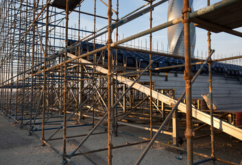 Network of scaffold adjustable jacks for construction of grandstand