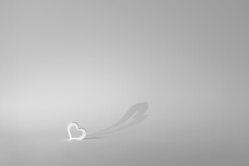 Heart figure with shadow on a white background
