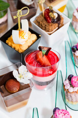 Mini snacks for buffet and banquet in a plastic bowl on a white background.