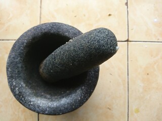 Fototapeta na wymiar stone mortar and pestle