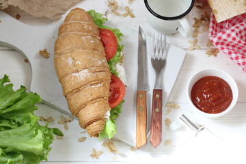 sandwich with tomatoes and soft cheese
