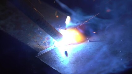 Welder. Electric welding of metal. Working metal. very slowly steel and iron, making the surface smooth. causes sparks. flame, mechanic, electric, mechanical, craftsman, job, metalwork, hand, - Powered by Adobe