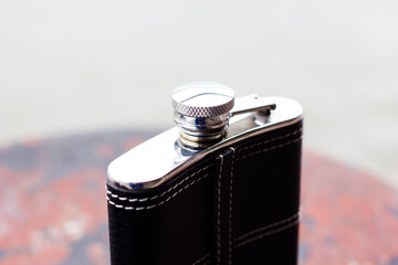 
Metal flask for alcoholic drinks. Nature, summer, spring, vacation, vacation.