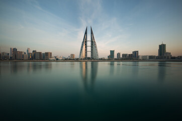 Fototapeta na wymiar The Bahrain World Trade Center during dusk, a twin tower complex is the first skyscraper in the world to have wind turbines, photographed on February 05, 2018, Manama, Bahrain