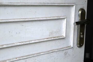 dirty white door and the handle