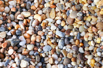 Background with various small sea colored stones