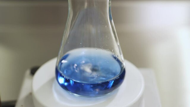 Chemical experiment in a laboratory.