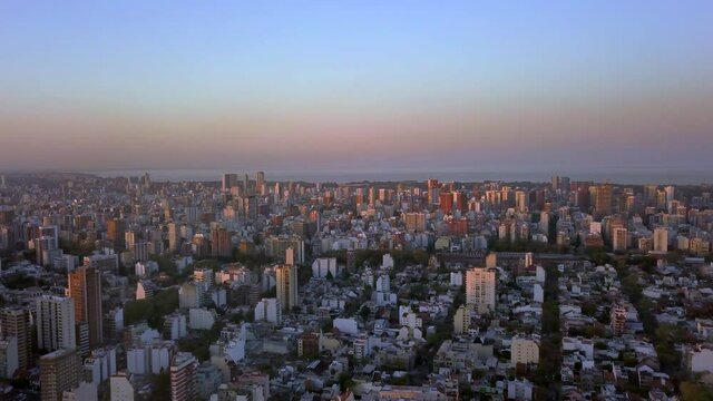 Warm summer nightfall airview over a suburb neighborhood in Buenos Aires City
