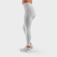 Mockup of white leggings on a slim girl in light sneakers, skin-tight women's pants, for presentation of design, side view.