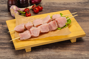Raw pork meat skewer for grill