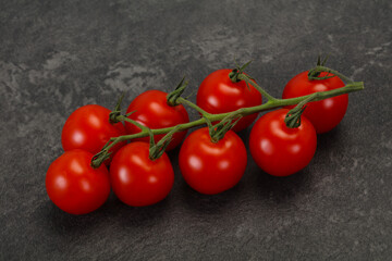 Ripe tomatoes on the branch