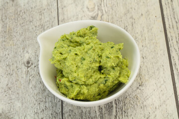 Avocado guacamole sauce with chili pepper