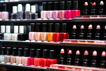 Set of cosmetics on shelves in beauty store