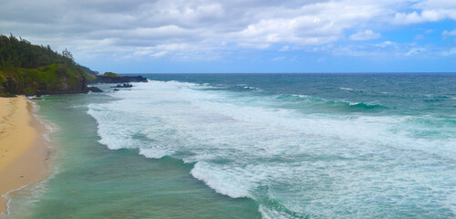Cloudy with seascape and beach in tropical. Ocean with a wave.