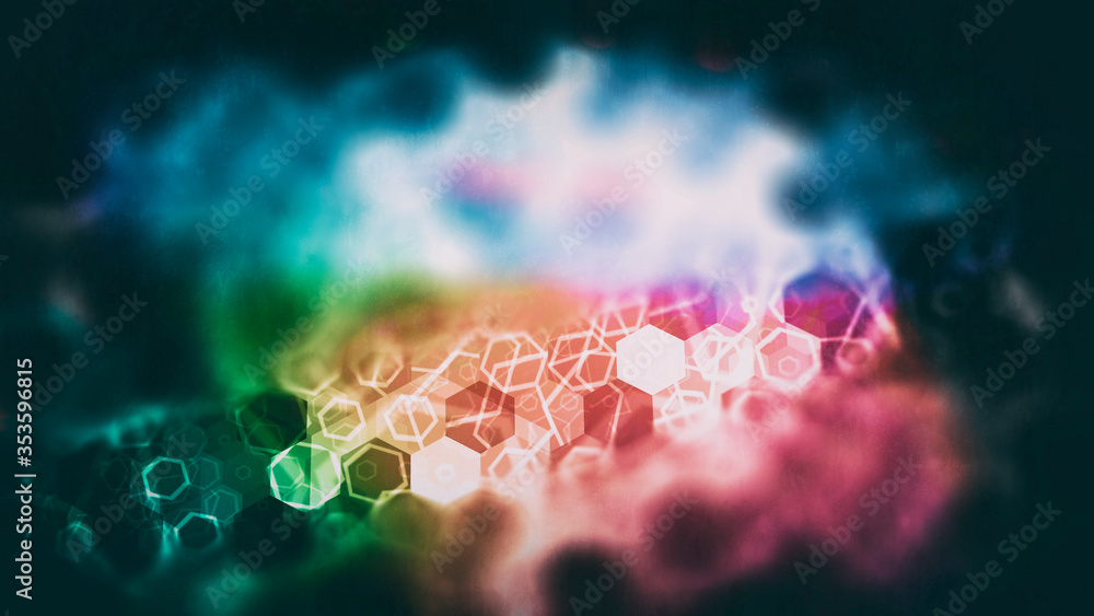 Poster abstract composition - spherical substance of small particles neon colors on a dark background, blur