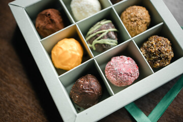colored truffle candies in a gift box