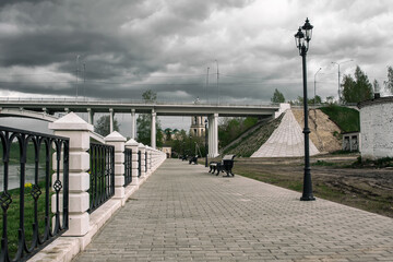 Beautiful old promenade with benches and lanterns