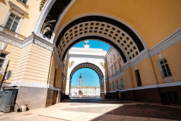 Fototapeta premium Yellow arch leading to the Palace square to the Hermitage Museum in Saint Petersburg, a tourist attraction in the summer