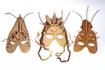 3 masks made from natural materials. A cute activity activity for children used in drama.