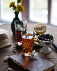 cup of tea with lemon and flowers