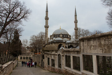 Fototapeta na wymiar View of the Eyup Sultan Mosque in Istanbul in rainy weather , Turkey