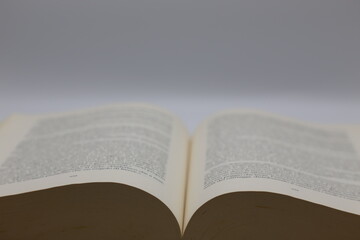 old open book on white background