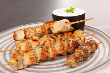 Bbq skewers on plate.