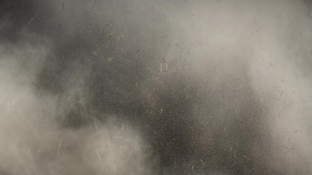 
4K Dust and hay explosion cloud descending in slow-motion. Atmospheric smoke. Haze background. Abstract smoke cloud. Smoke in slow motion on black background. White smoke slowly floating through spac