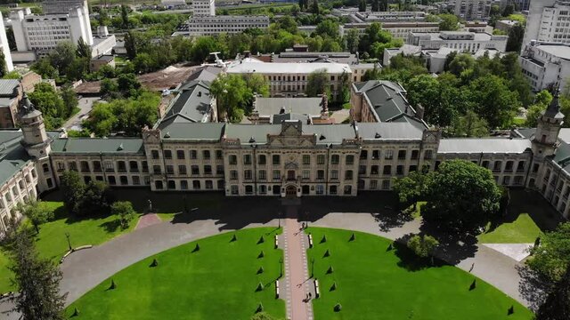 Ancient building university aerial drone around movement brick facade yard Kiev Polytechnic Institute Ukraine