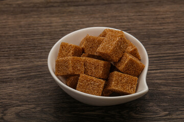 Cane sugar cubs in the bowl