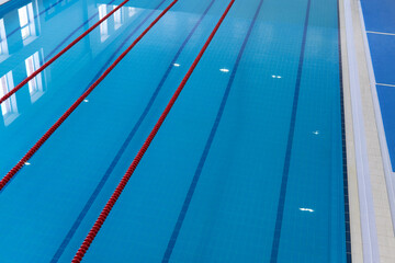 Swimming pool. Empty tracks races of a sports swimming pool. Top view