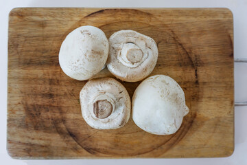 mushrooms isolated on wood table