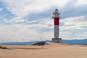 DELTA DE L'EBRE, TARRAGONA, CATALUNYA, SPAIN - JUNE 5, 2019: Beach of "punta del fangar" lighthouse "far del fangar".