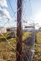 Installation of a metal mesh on the fence.