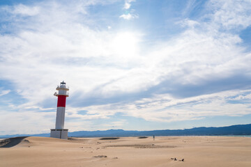 DELTA DE L'EBRE, TARRAGONA, CATALUNYA, SPAIN - JUNE 5, 2019: Beach of "punta del fangar" lighthouse "far del fangar".
