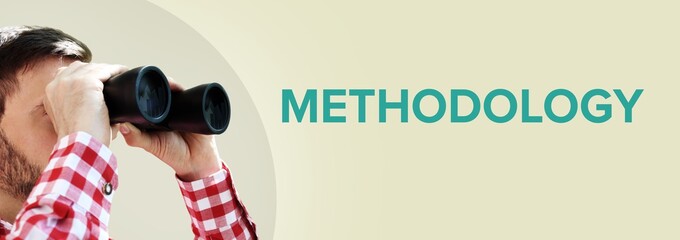 Methodology. Businessman (man) looks through binoculars. Focus on text. Background beige. Business,...