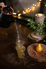 green tea is poured into the cups