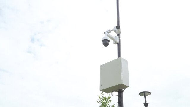Security cameras on a pillar