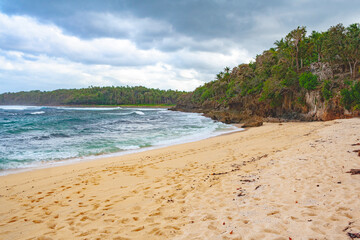 Beautiful beach in the Philippines with blue sky and clouds