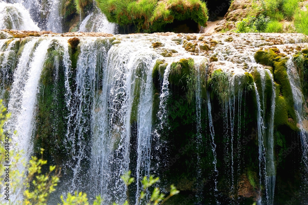 Wall mural beautiful waterfalls in national park krka, croatia on a sunny summer day.