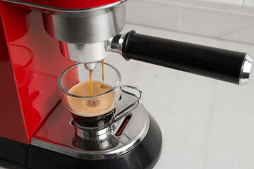 coffee maker and cup of coffee