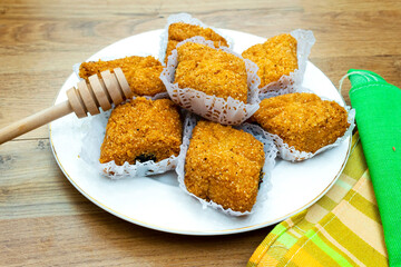 Fried Makrout - Algerian semolina, dates and honey sweets, traditional North Africa sweet food