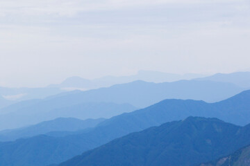 Mountain range landscape, horizon and hills, blue color gradient