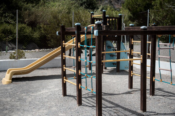Fototapeta na wymiar empty playground with swings