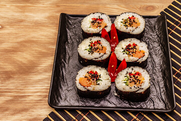 Korean roll Gimbap(kimbob). Steamed white rice (bap) and various other ingredients