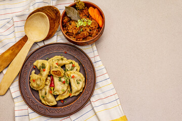 Dumplings stuffed stewed cabbage and sour cream. Traditional Ukrainian dish varenyky