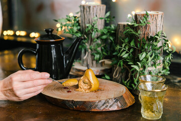 cake in the form of a pear on a wooden stump cut