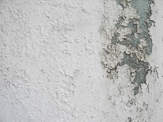 Texture of white cracked concrete surface with peeling paint. Stone background for design.     
