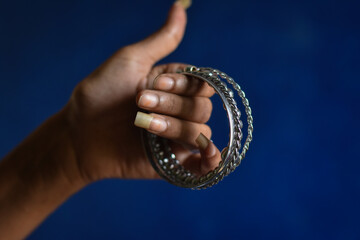 indian traditional colorful  bangle in a woman hand with shallow depth of field, Indian Traditional Bangle 
