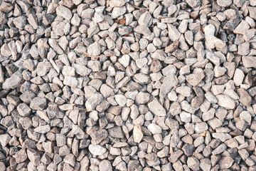 Naklejka premium White and grey gravel texture in garden. Pebble background.